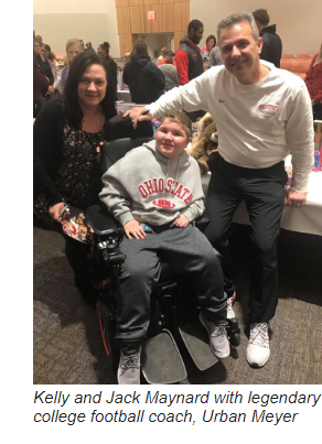 Kelly and Jack Maynard with Urban Meyer